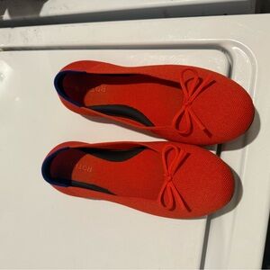 Rothy's Vibrant Red Flats with Blue Accents
